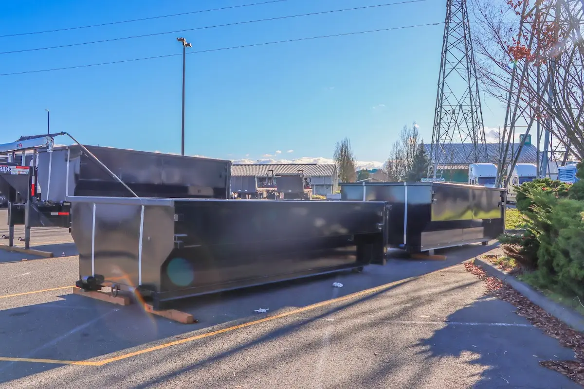 Roll-off dumpster ready for waste disposal at job site for 15 Yard Dumpster Rental in Albany